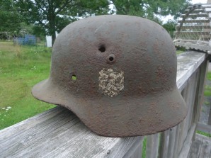 M35 Combat Helmet With Bullet Hole image 1